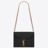 Saint Laurent Cassandra Clasp Bag In Black Grained Leather