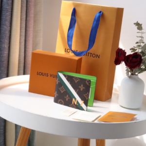 Louis Vuitton PF. Multiple Wallet Monogram Coated Canvas